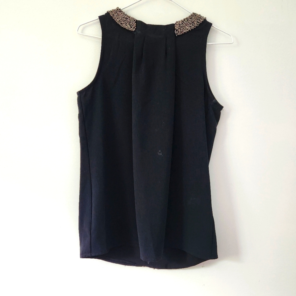 Mandee black sleeveless blouse.